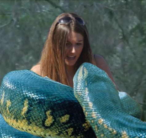 Woman squeezed by snake